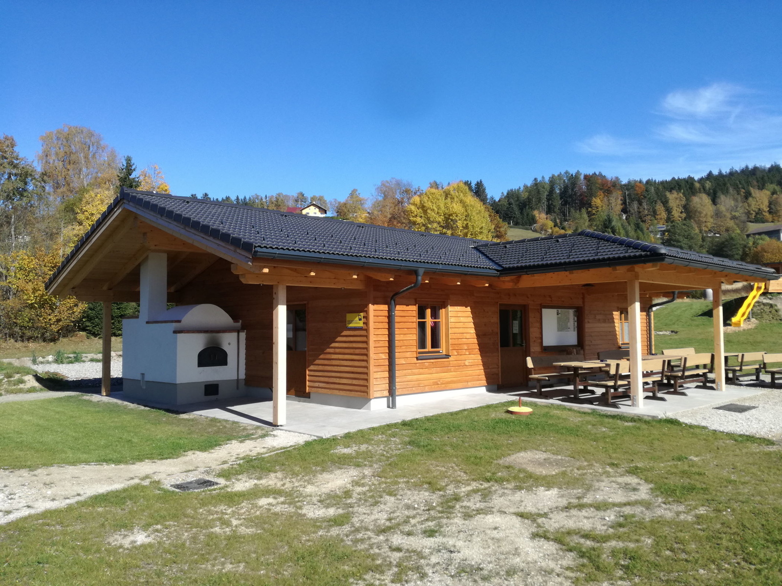 Holzhaus Seitenansicht von Zimmerei – Holzbau Furtlehner